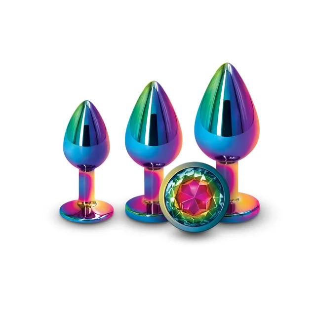 Three graduated rainbow plugs with round jeweled flared bases