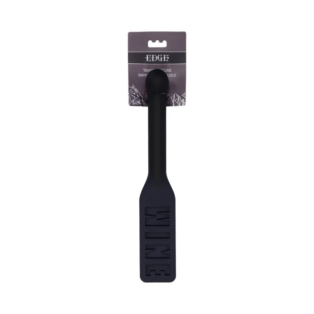 Black Sportsheets Edge silicone paddle with raised MINE lettering