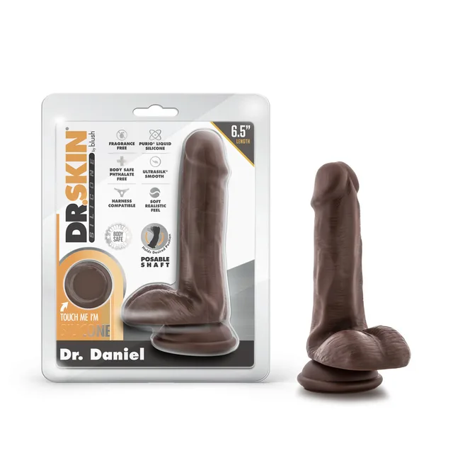 Dr. Daniel brown posable dildo beside clear retail package