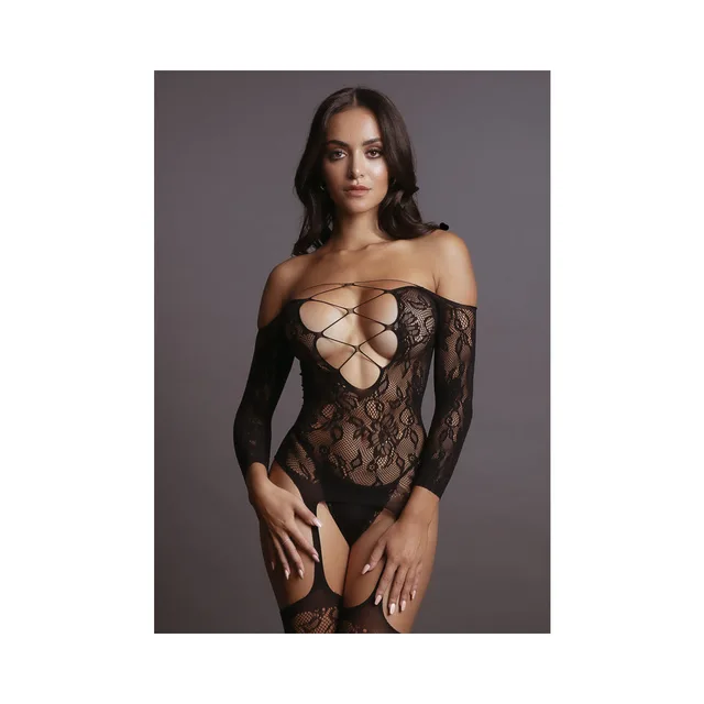 Close-up of deep V straps and black lace body