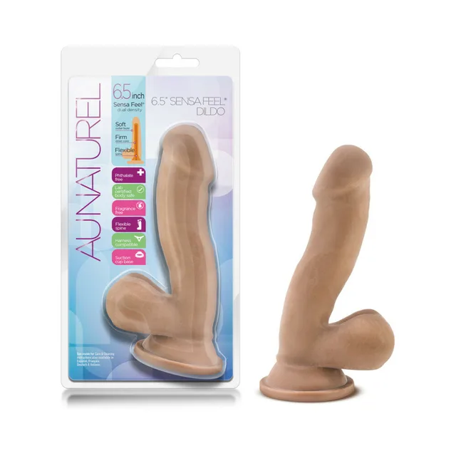 Au Naturel Tan 6.5 Inch Dildo beside blue white retail blister