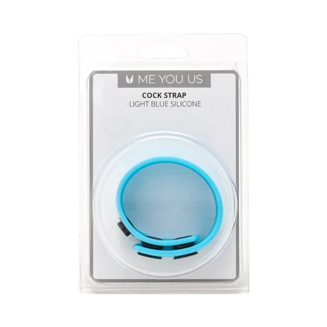 Me You Us light-blue silicone cock strap coiled inside clear blister with black slider detail at lower edge