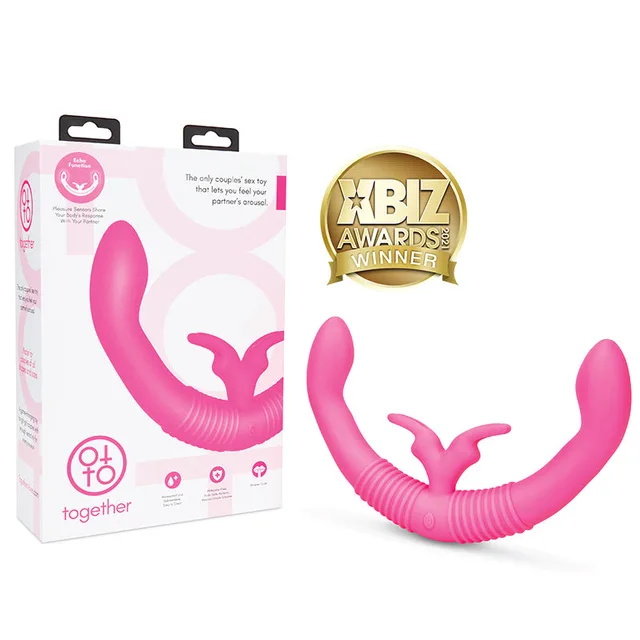 Together hot pink dual-ended rabbit vibrator beside white box