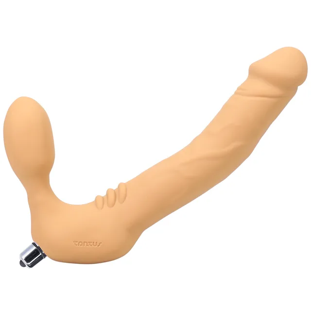 Honey Tantus Real Strapless dual-ended dildo with silver bullet inserted