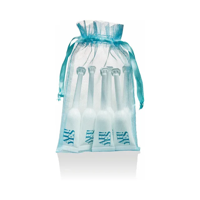 six AH YES WB applicators grouped in turquoise drawstring pouch