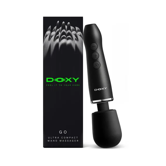 Doxy Go travel black wand beside black retail box