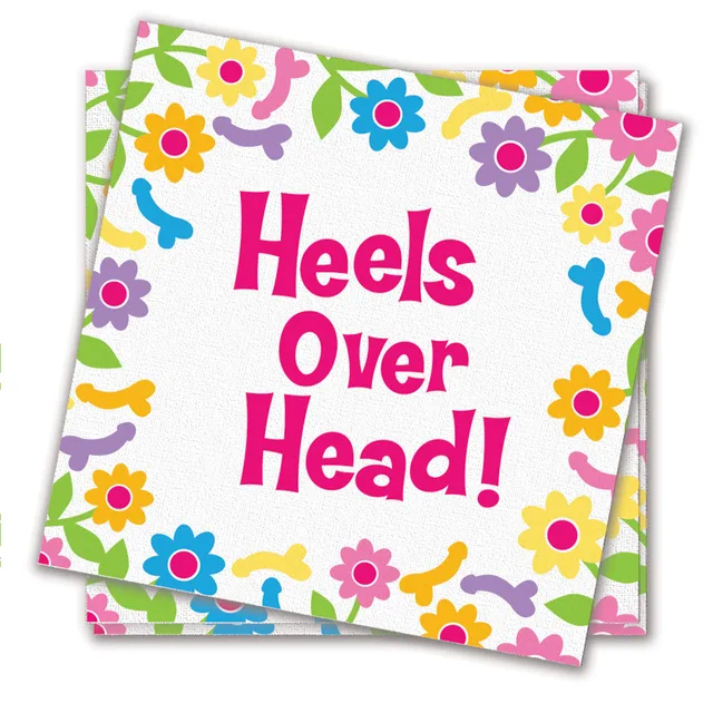 Stack of white Heels Over Head napkins with pink text and colorful flowers