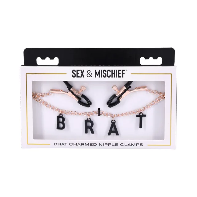 rose gold Sportsheets nipple clamps with black BRAT letter charms in window box