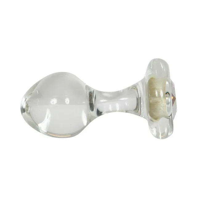 small clear rounded glass plug with Aurora Borealis gem in base