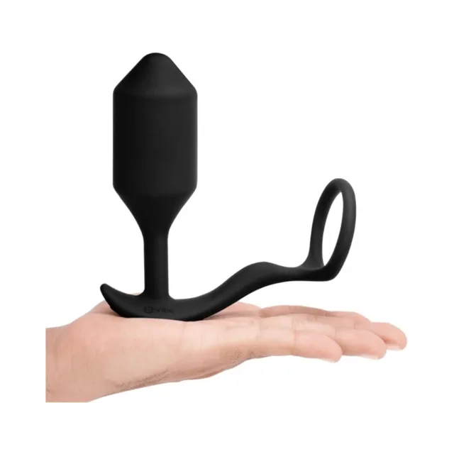 Large black Snug and Tug balanced across one hand