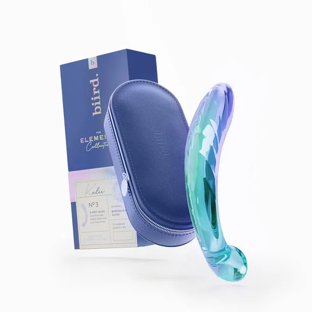 Biird Kalii glass dildo beside blue zippered case and retail box