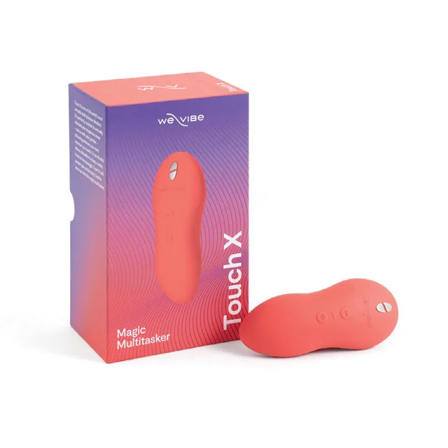 Crave Coral We-Vibe Touch X vibrator beside purple retail box