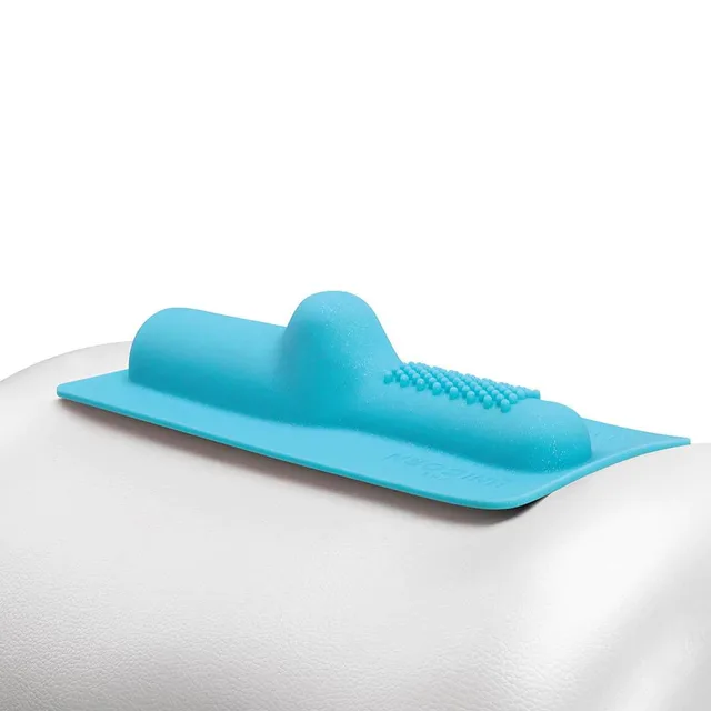 Blue Magic Hide attachment positioned on white cushion