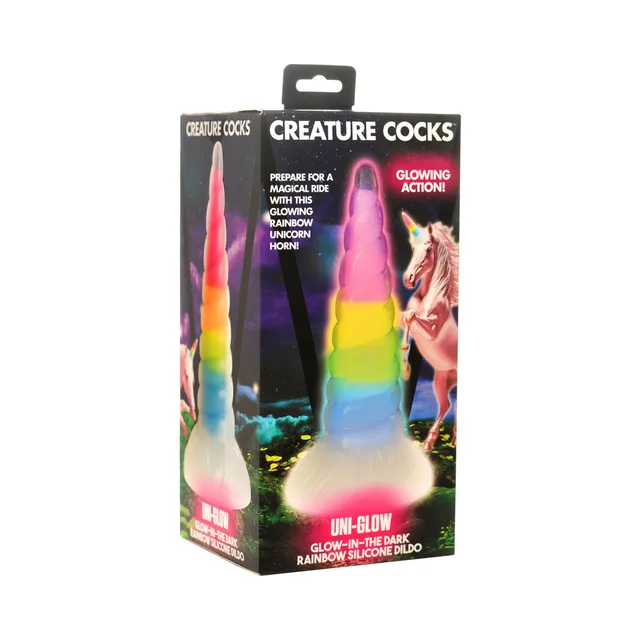 Creature Cocks Uni-Glow rainbow spiral horn dildo beside black illustrated retail box