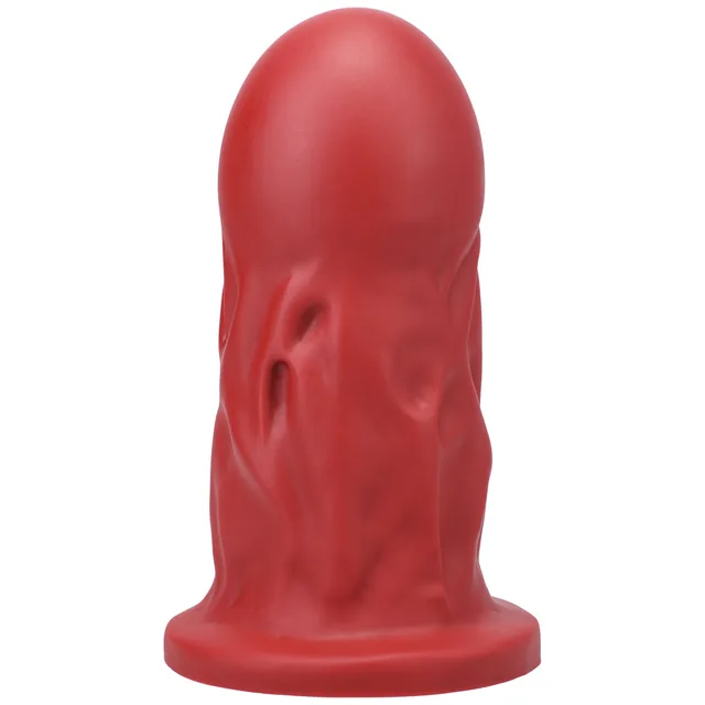 Left angle of red Tantus Mr Universe with oversized rounded head