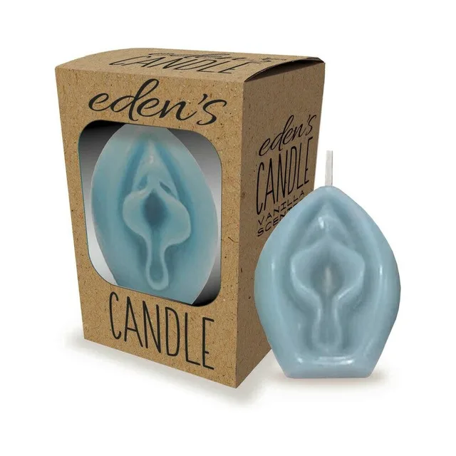 blue sculpted Eden's vagina candle beside kraft cardboard window box