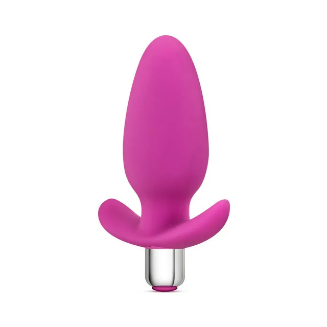 Luxe Little Thumper Pink front view of oval shaft and winged base