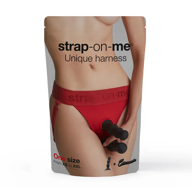 red Strap-On-Me Unique lingerie harness displayed on a torso-shaped retail card