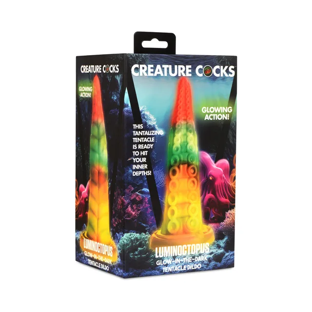 Creature Cocks Luminoctopus multicolor glow tentacle beside illustrated retail box