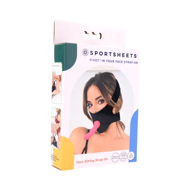 Sportsheets Pivot black face strap-on harness with pink center attachment pictured on retail box