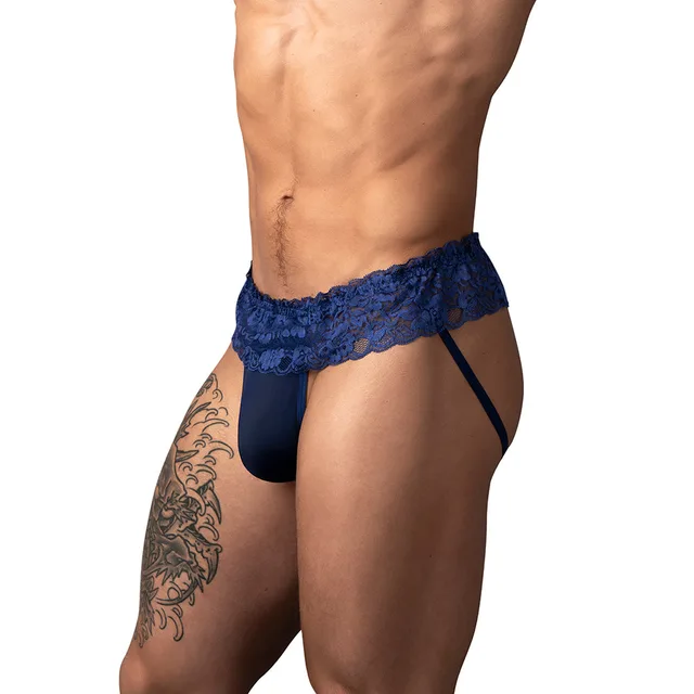 Male Power Sassy Lace Skirt Jock in navy size S/M worn from the front to show the solid pouch and lace waistband
