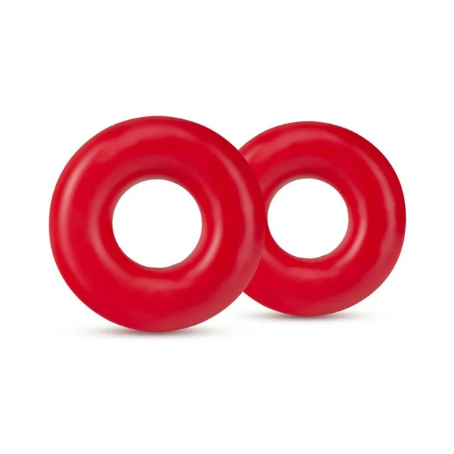 Two oversized red donut rings with broad rounded profiles
