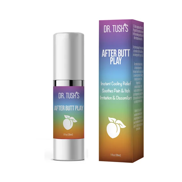 Dr. Tush's After Butt Play Pride 12-pack 1 oz pump bottle beside rainbow-gradient retail carton