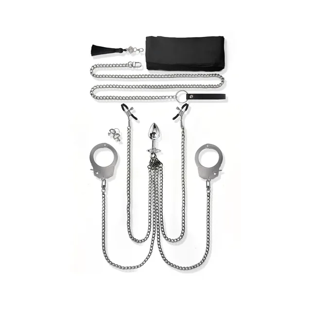 Nixie cuffs clamps chains tassel and pouch on white background