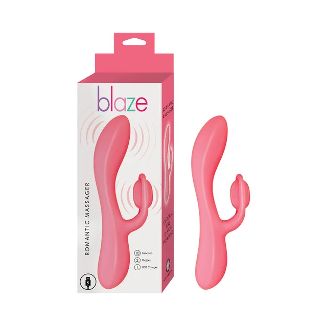 Red Nasstoys Blaze curved massager with loop arm beside pink retail box
