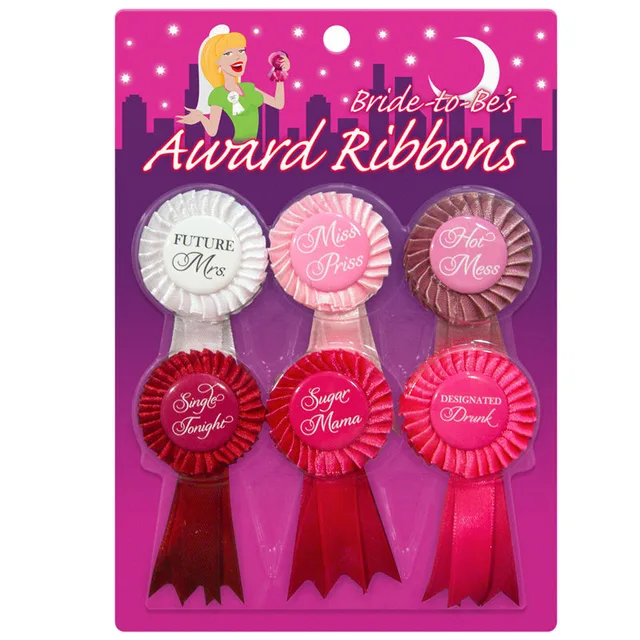 pink card holding six multicolor Bride-to-Be award rosette ribbons