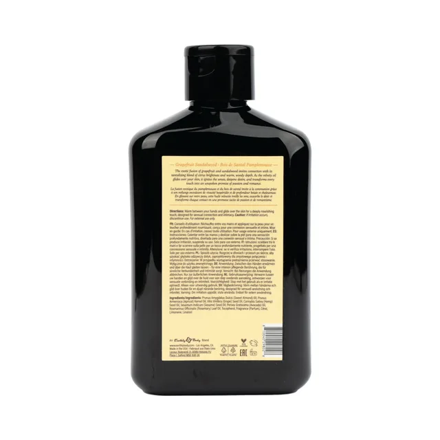 Back label of 8.4 oz grapefruit sandalwood massage oil bottle