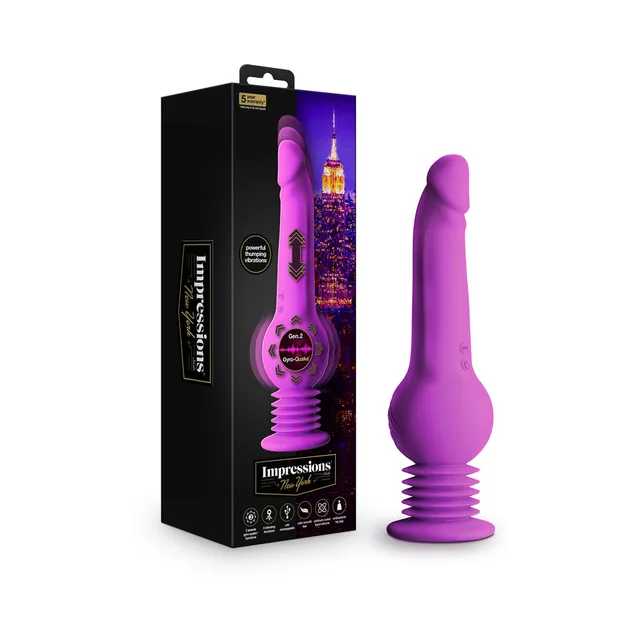purple Impressions New York Gyroquake dildo with ribbed base beside black box