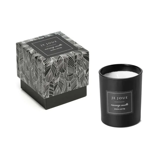Je Joue Jasmine and Lily candle beside feather-pattern box