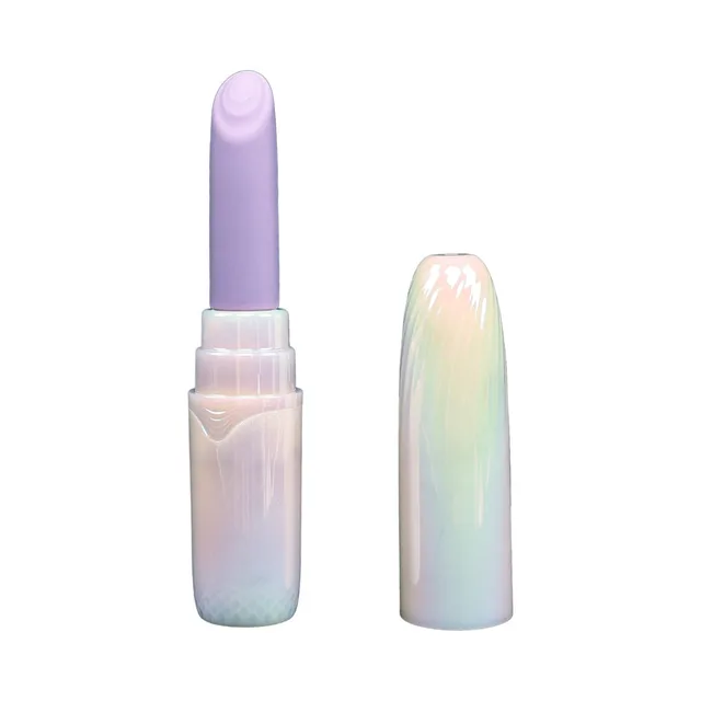 Pouty Pucker lilac lipstick vibrator beside iridescent cap