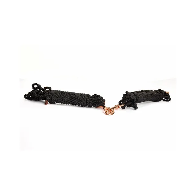 Two black Coquette rope bundles connected by metal clips
