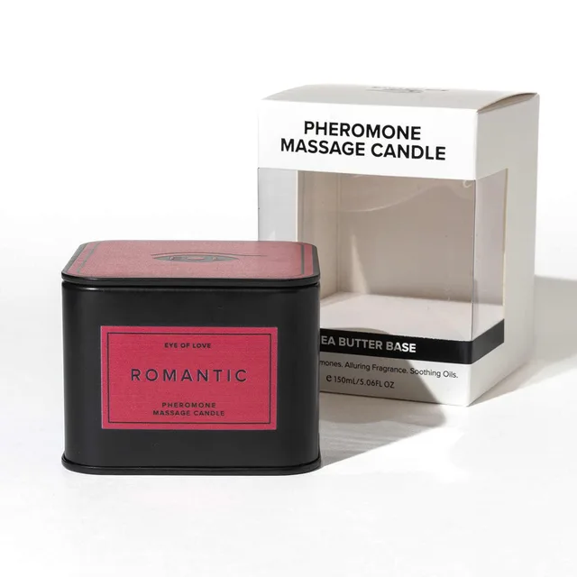 Romantic massage candle in black tin beside white retail box