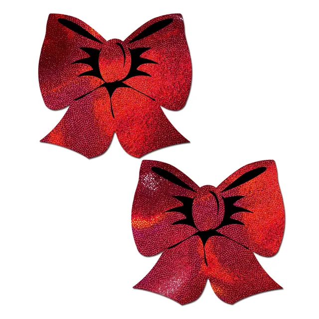 red holographic bow-shaped Pastease pasties with black ribbon details