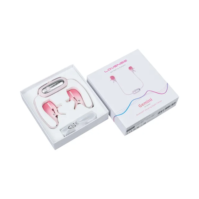 Open Lovense Gemini box with paired clamp modules
