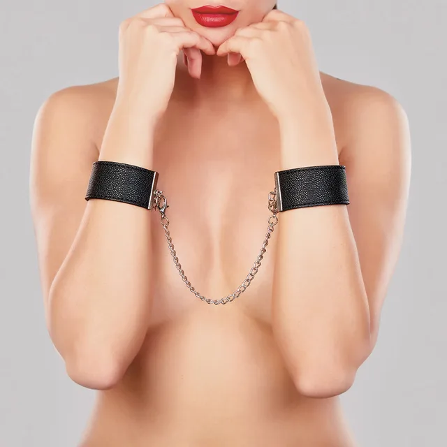Allure Adore Lust in Love black wrist cuffs front view with buckles clasps and detachable chain