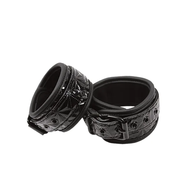 Sinful Black Vinyl Wrist Cuffs embossed black cuff pair with buckles