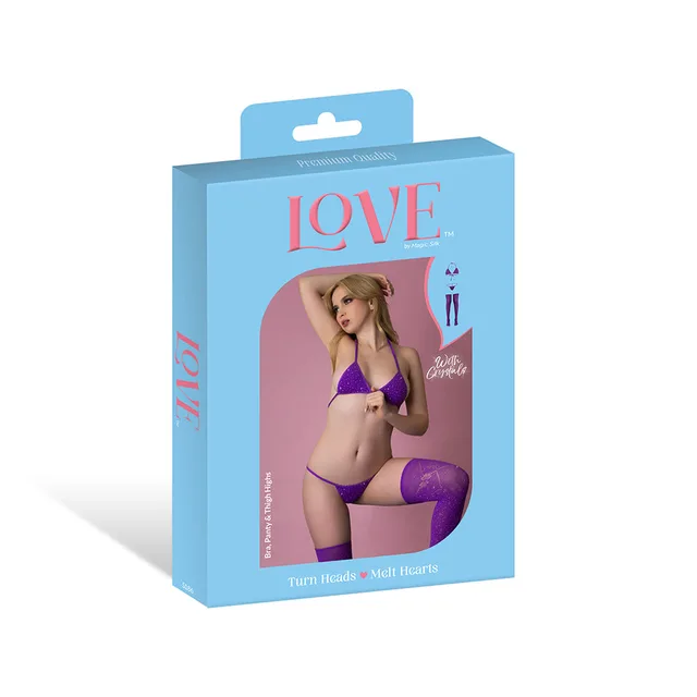 Magic Silk seamless purple bra panty thigh high set displayed in blue retail packaging