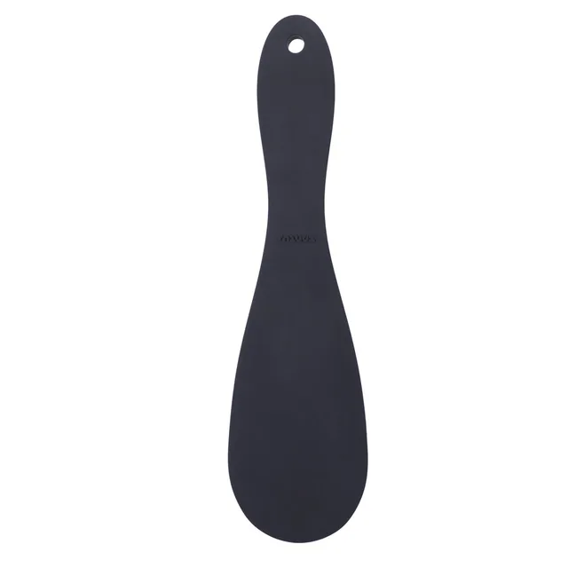 Black Tantus Pelt paddle with broad oval face and tapered handle
