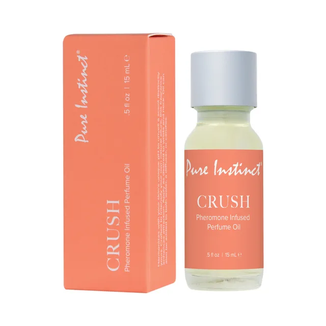 Pure Instinct Crush half-ounce perfume oil with white dropper cap beside orange box