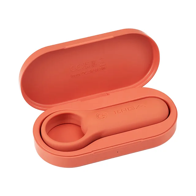TENGA paiRING Plus orange resting inside open oval case