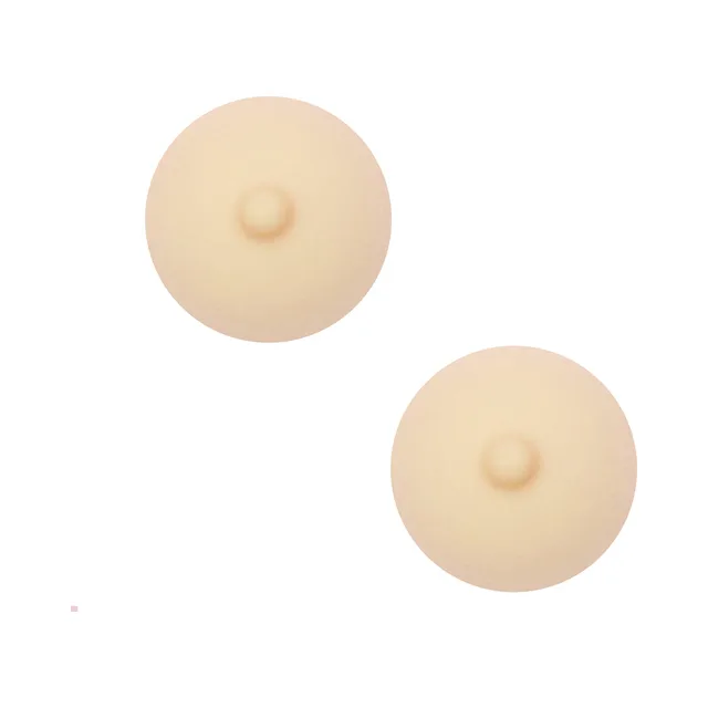 pair of nude round silicone nipple covers with raised central details