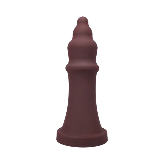 Side view of garnet Tantus The Queen showing tapered stacked profile