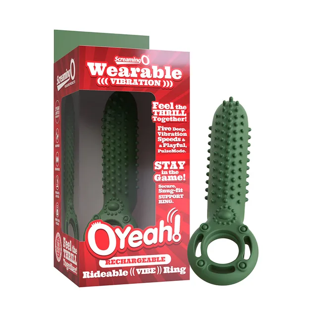 Green rechargeable OYeah ring beside red retail box