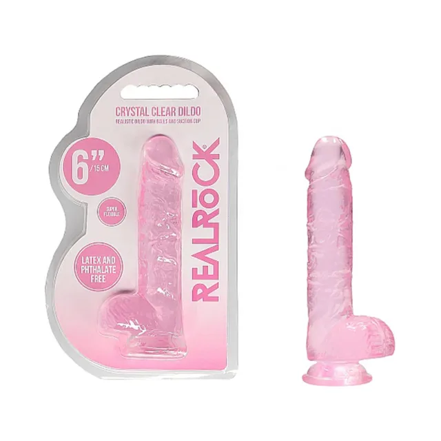 Pink RealRock Crystal Clear 6-inch dildo beside retail package