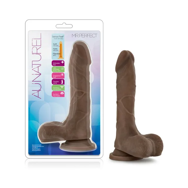 Blush Mister Perfect dark brown dildo beside clear Au Naturel retail package