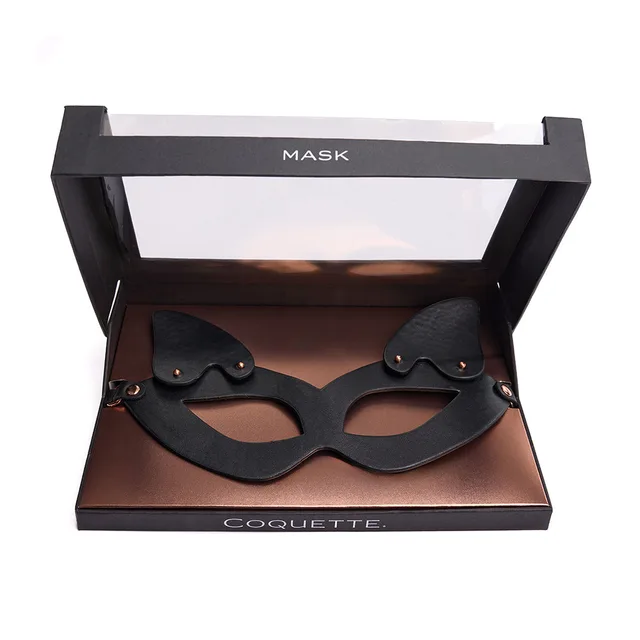 Open Coquette display box holding black cat-ear mask